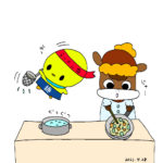 ぴよっきーとうーちゃんがラーメンを作っています。うーちゃんは野菜をいためています。ぴよっきーは湯切りをしています。